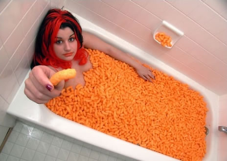 Who wastes that many cheese puffs!!! Such a waste, she better eat all those.